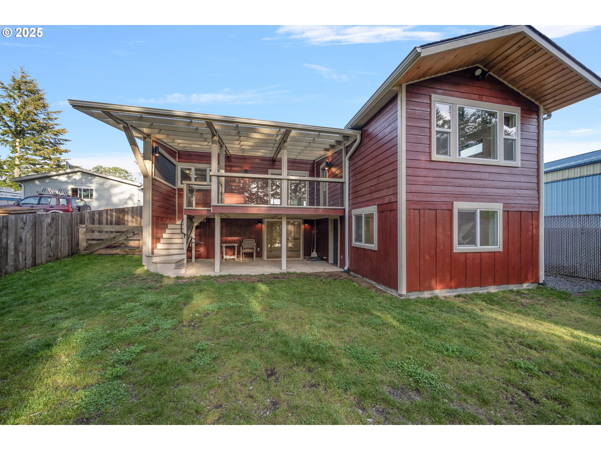 1955 28th Street Coos Bay, OR 97420 - Photo 11 of 48 a view of an house with backyard space and balcony
