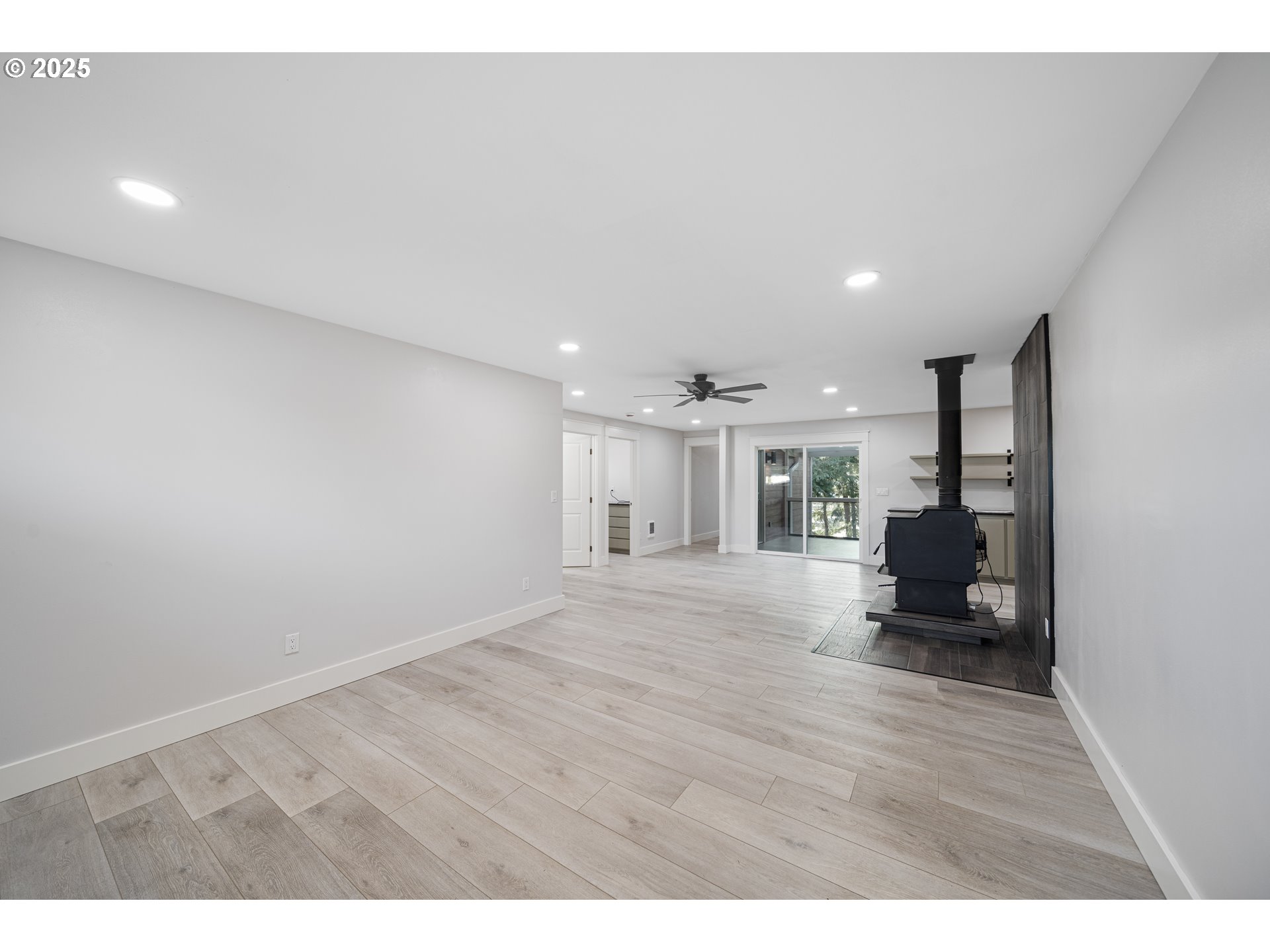 1955 28th Street Coos Bay, OR 97420 - Photo 13 of 48 a view of a room with furniture and floor to ceiling window