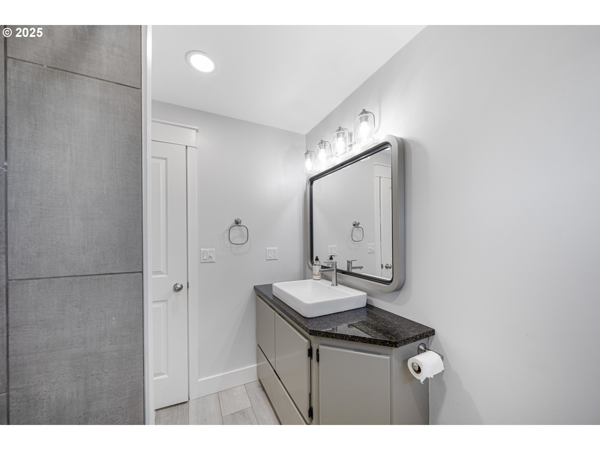 1955 28th Street Coos Bay, OR 97420 - Photo 23 of 48 a bathroom with a sink and a mirror