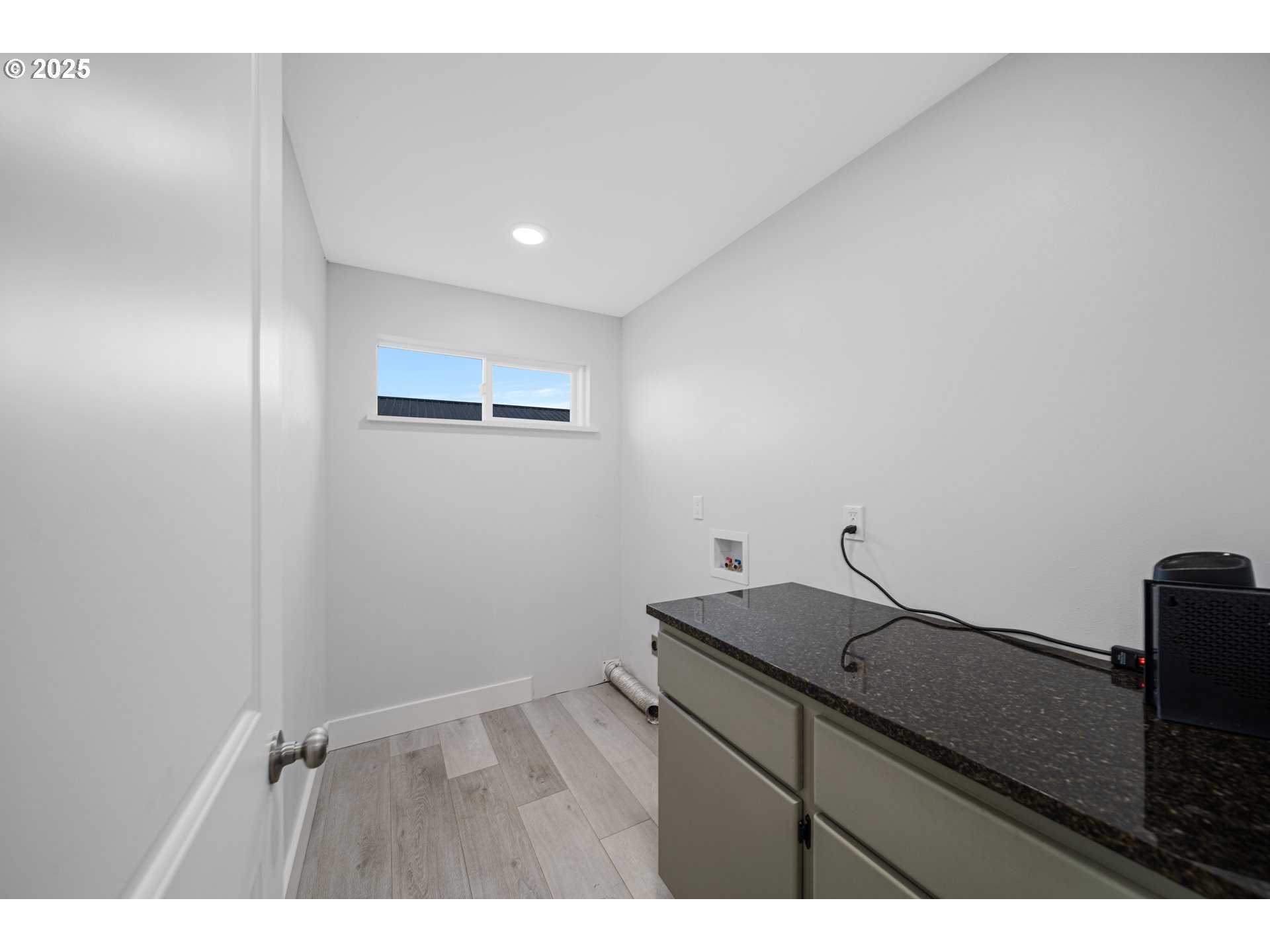 1955 28th Street Coos Bay, OR 97420 - Photo 24 of 48 a kitchen with a sink and cabinets