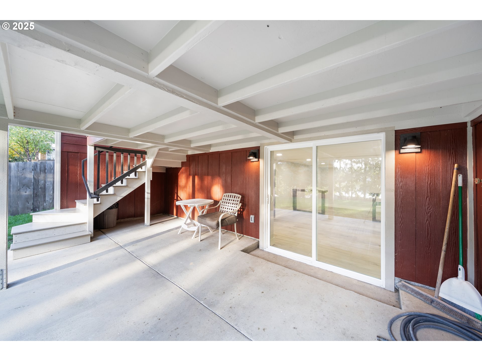 1955 28th Street Coos Bay, OR 97420 - Photo 35 of 48 a living room with furniture gym equipment and a large window