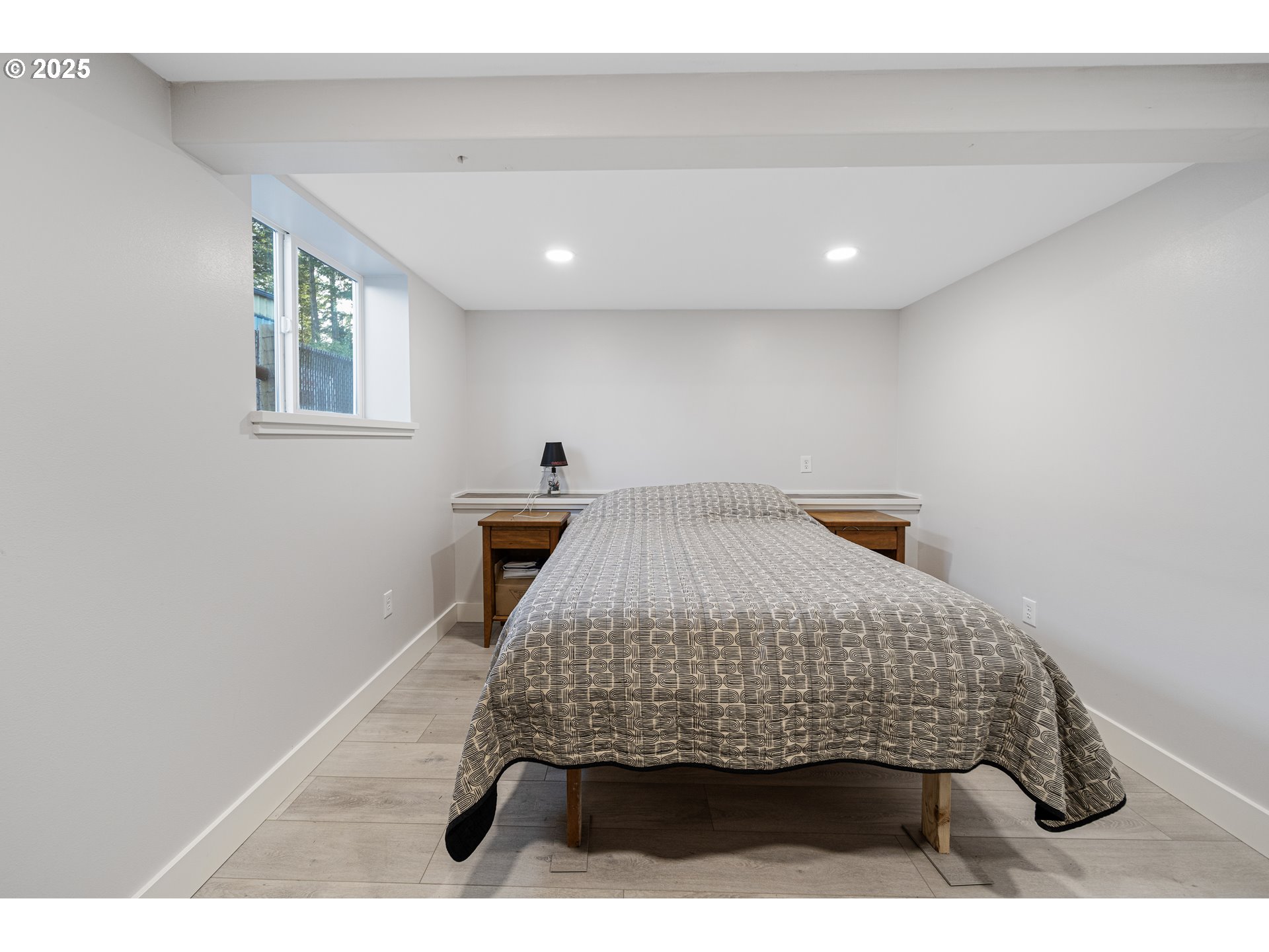 1955 28th Street Coos Bay, OR 97420 - Photo 42 of 48 a bedroom with a bed and a window