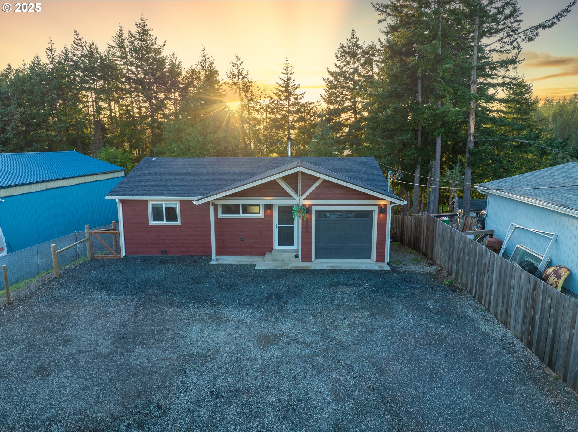 1955 28th Street Coos Bay, OR 97420 - Photo 5 of 48 a front view of a house with a yard and garage