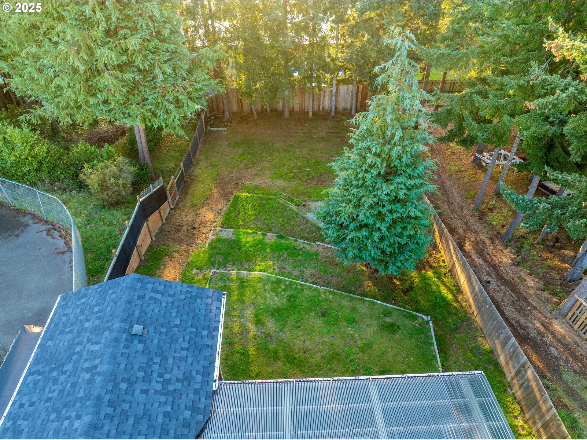 1955 28th Street Coos Bay, OR 97420 - Photo 8 of 48 a backyard of a house with lots of green space