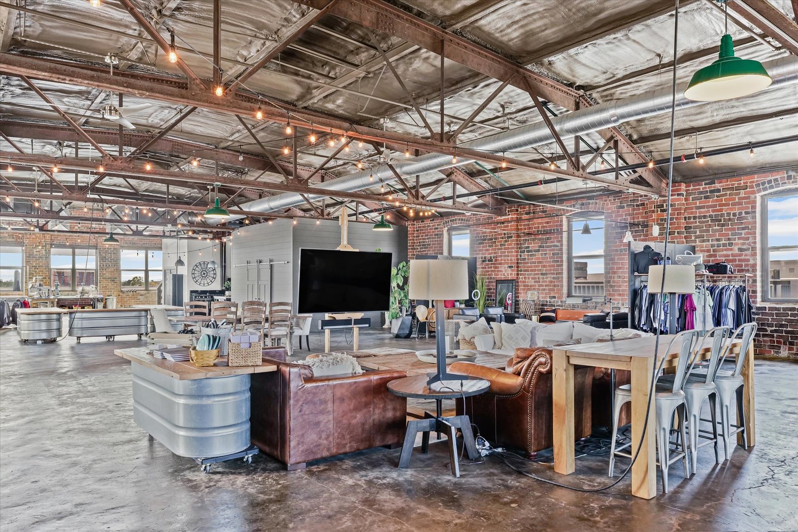 209 East Washington Street, Unit 5 Bloomington, IL 61701 - Photo 15 of 78 a living room with lots of furniture and a flat screen tv