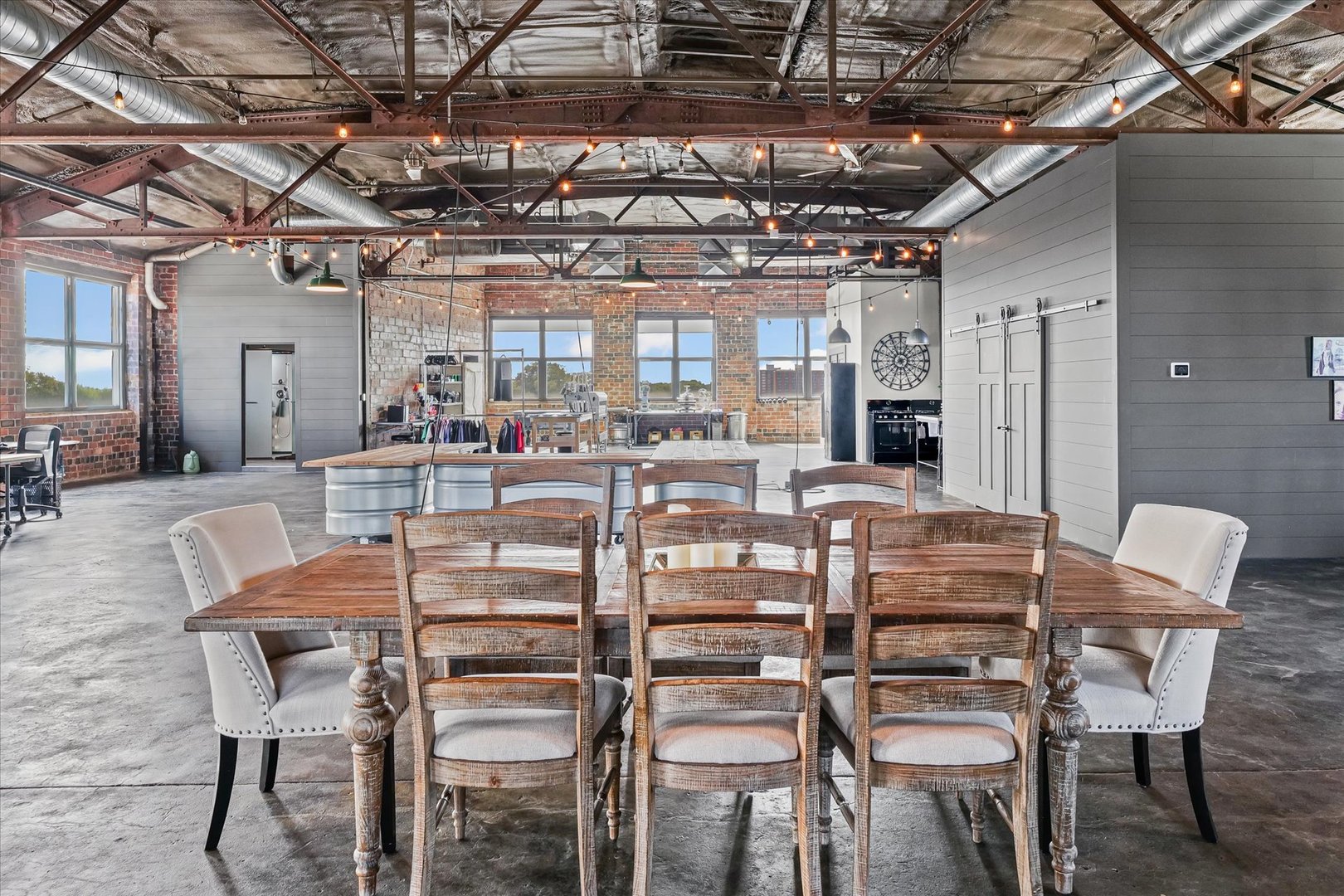 209 East Washington Street, Unit 5 Bloomington, IL 61701 - Photo 21 of 78 a dining room with furniture a chandelier and kitchen view