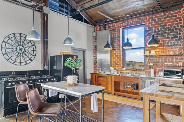 a backyard of a house with seating space