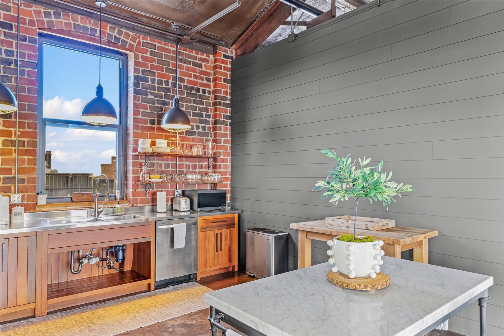 209 East Washington Street, Unit 5 Bloomington, IL 61701 - Photo 25 of 78 a view of a dining room with furniture and a potted plant
