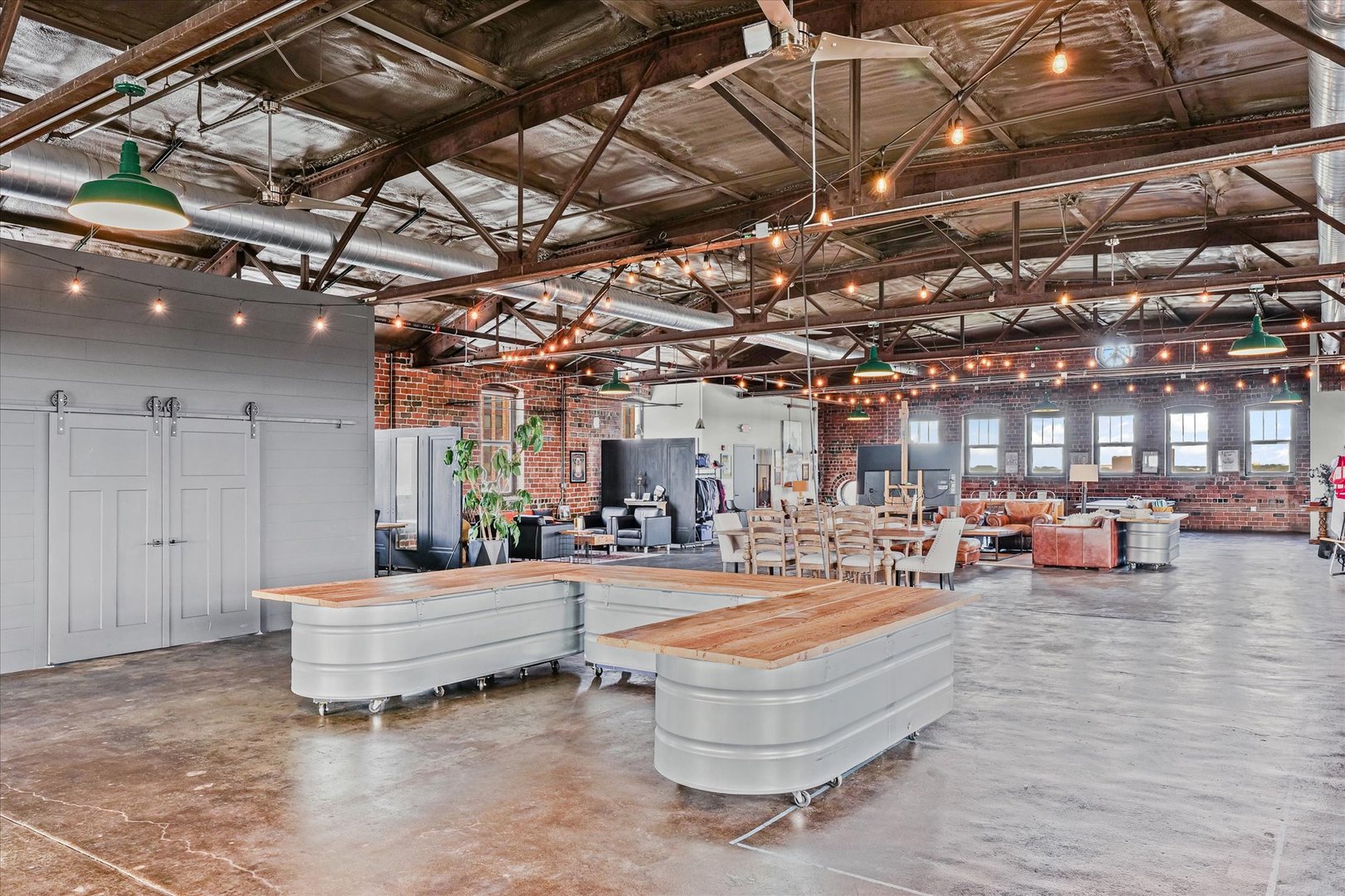 209 East Washington Street, Unit 5 Bloomington, IL 61701 - Photo 35 of 78 a living room with furniture and a flat screen tv