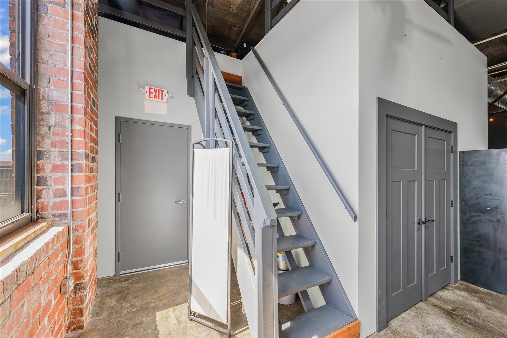 209 East Washington Street, Unit 5 Bloomington, IL 61701 - Photo 43 of 78 a view of an entryway with staircase