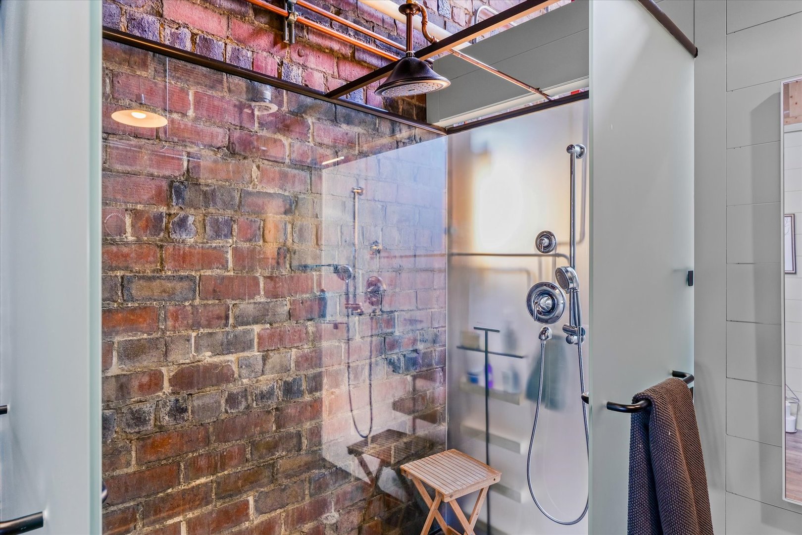 209 East Washington Street, Unit 5 Bloomington, IL 61701 - Photo 53 of 78 a bathroom with a toilet and a shower