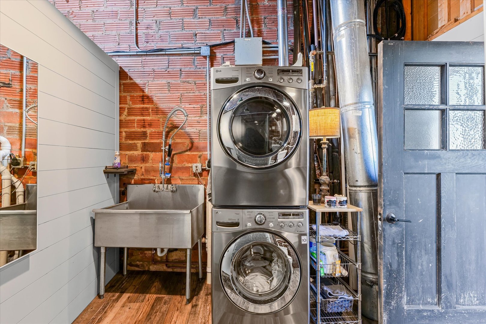 209 East Washington Street, Unit 5 Bloomington, IL 61701 - Photo 54 of 78 a view of livingroom with washer and dryer