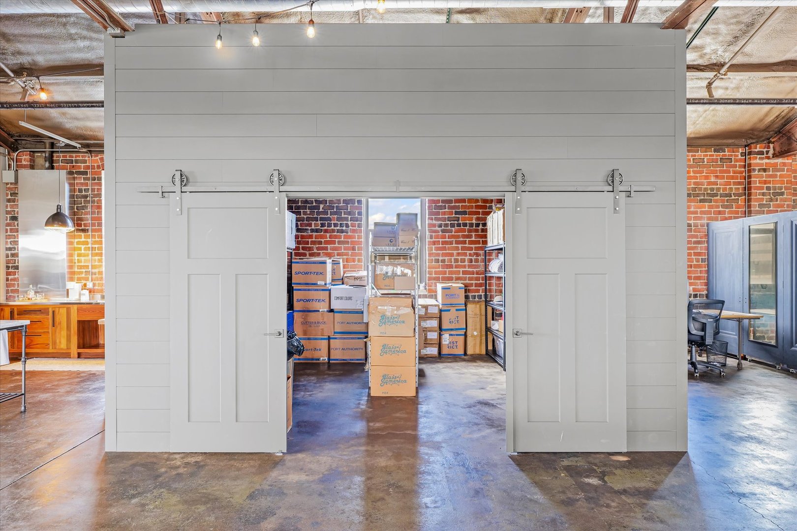 209 East Washington Street, Unit 5 Bloomington, IL 61701 - Photo 55 of 78 a view of empty room with wooden floor and chair