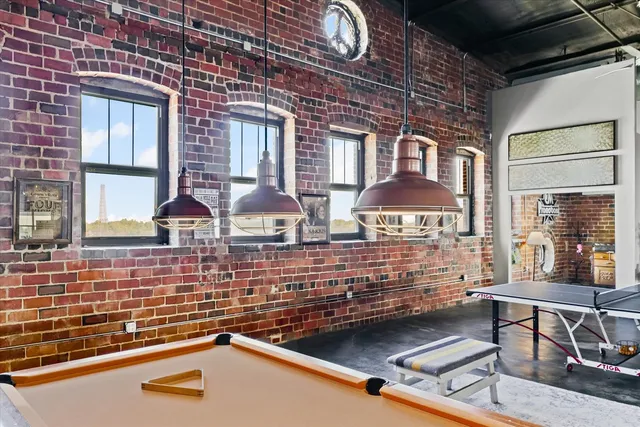 a living room with lots of furniture and a flat screen tv