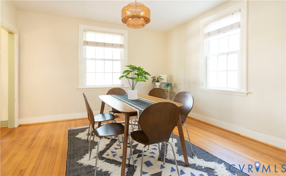 4801 Brook Road Richmond, VA 23227 - Photo 11 of 28 a view of a dining room with furniture and wooden floor