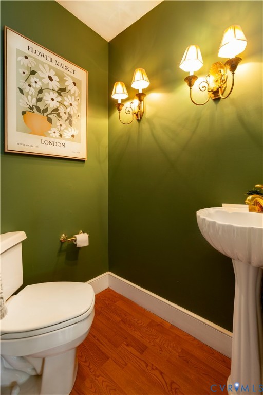 4801 Brook Road Richmond, VA 23227 - Photo 12 of 28 a bathroom with a toilet sink and vanity