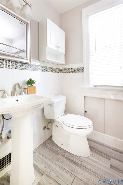 4801 Brook Road Richmond, VA 23227 - Photo 17 of 28 a bathroom with a sink and a toilet