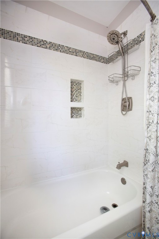 4801 Brook Road Richmond, VA 23227 - Photo 18 of 28 a bathroom with a shower and a bath tub