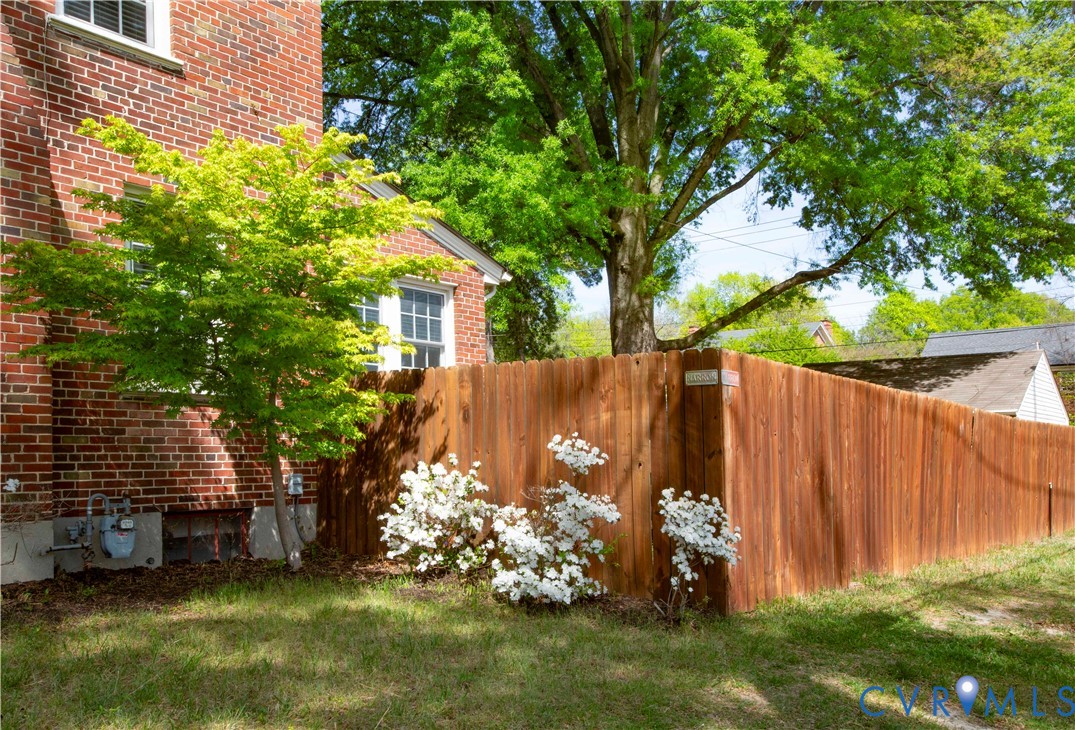 4801 Brook Road Richmond, VA 23227 - Photo 24 of 28 a view of backyard with a barn and a large tree