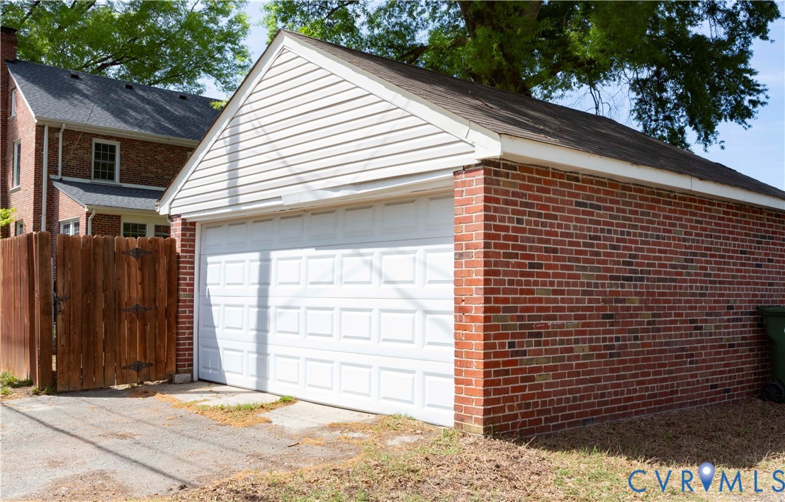 4801 Brook Road Richmond, VA 23227 - Photo 25 of 28 a front view of a house with a garage