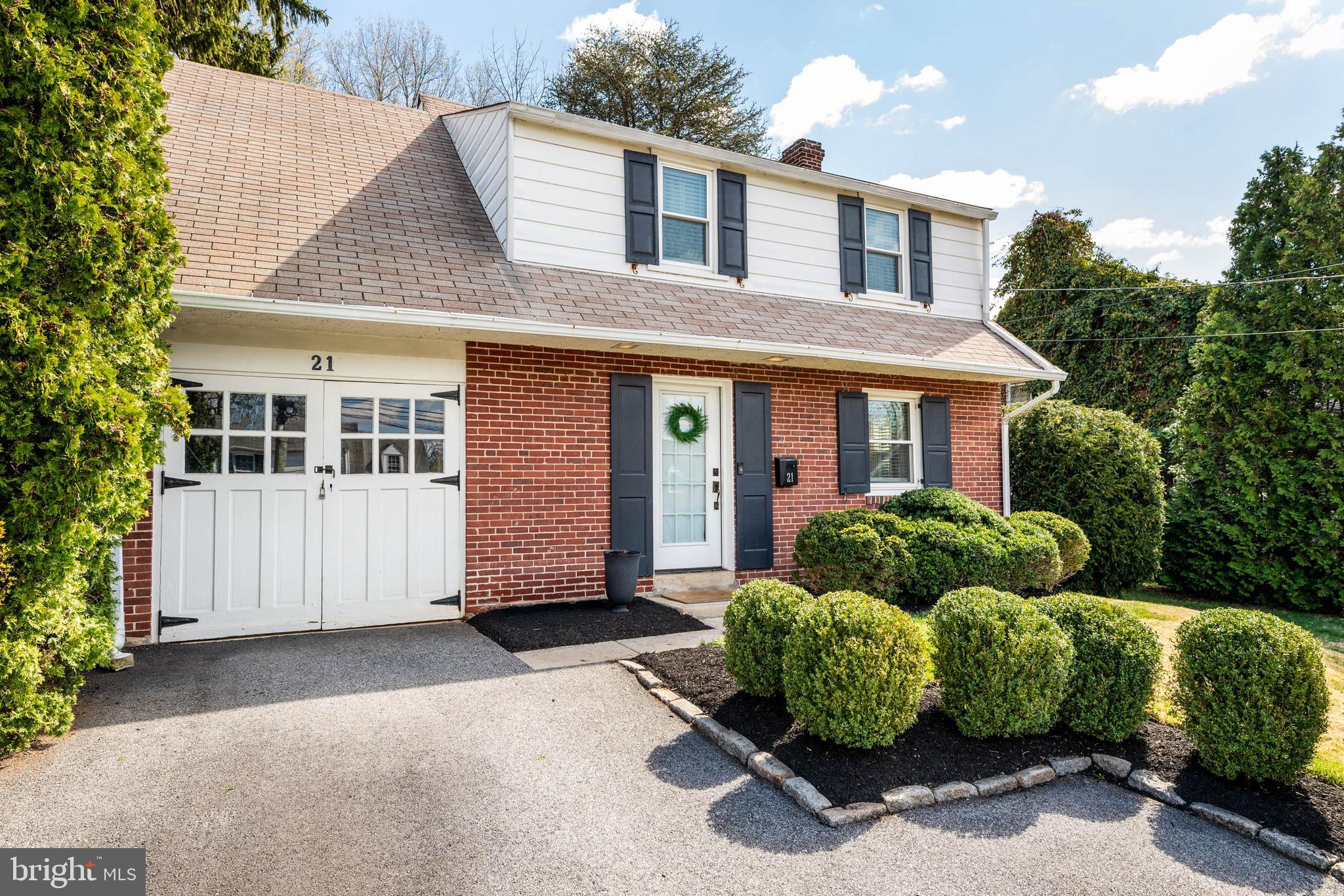 a view of a house with a garden