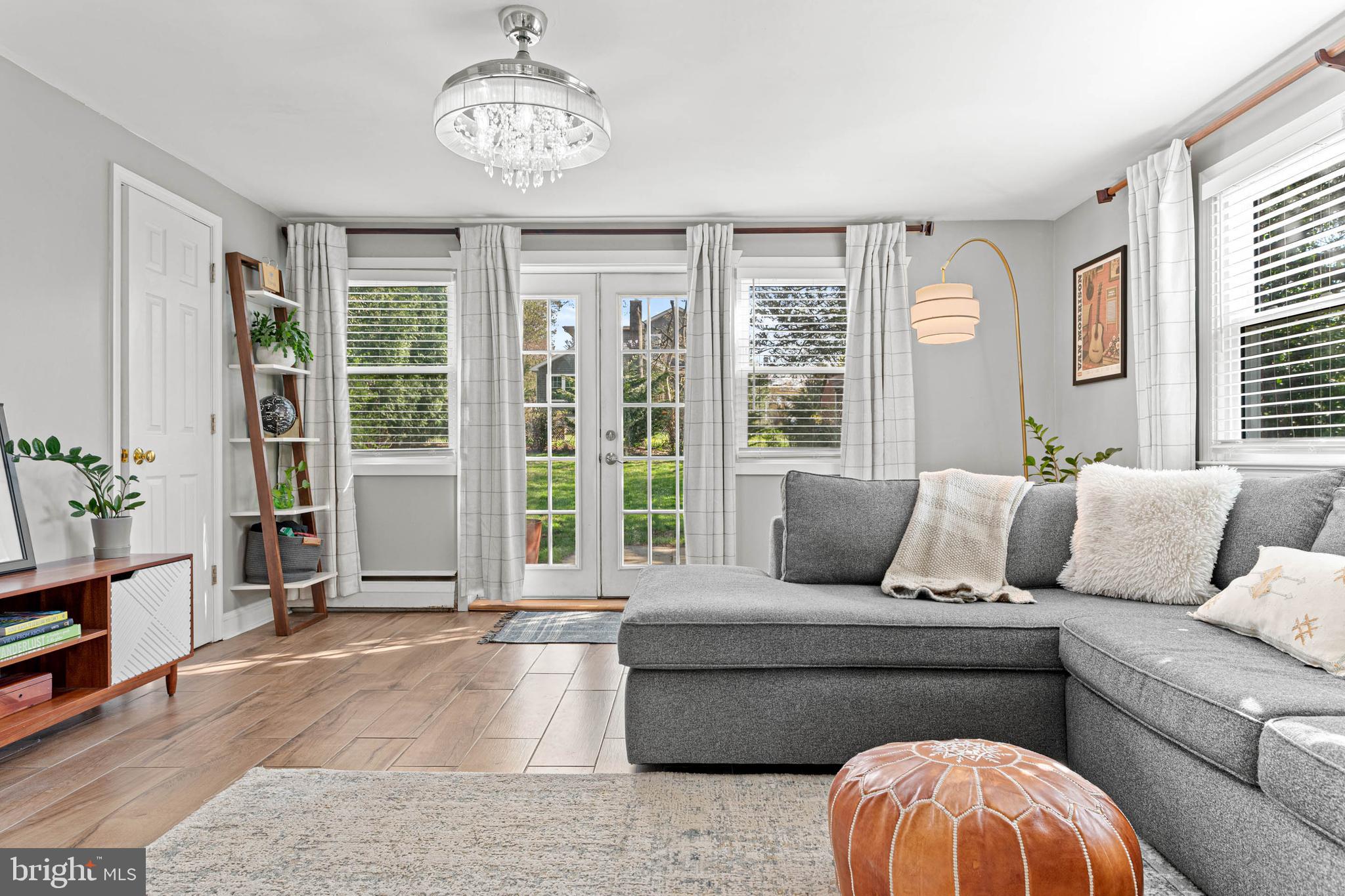21 Moreland Road Paoli, PA 19301 - Photo 11 of 29 a living room with furniture and windows
