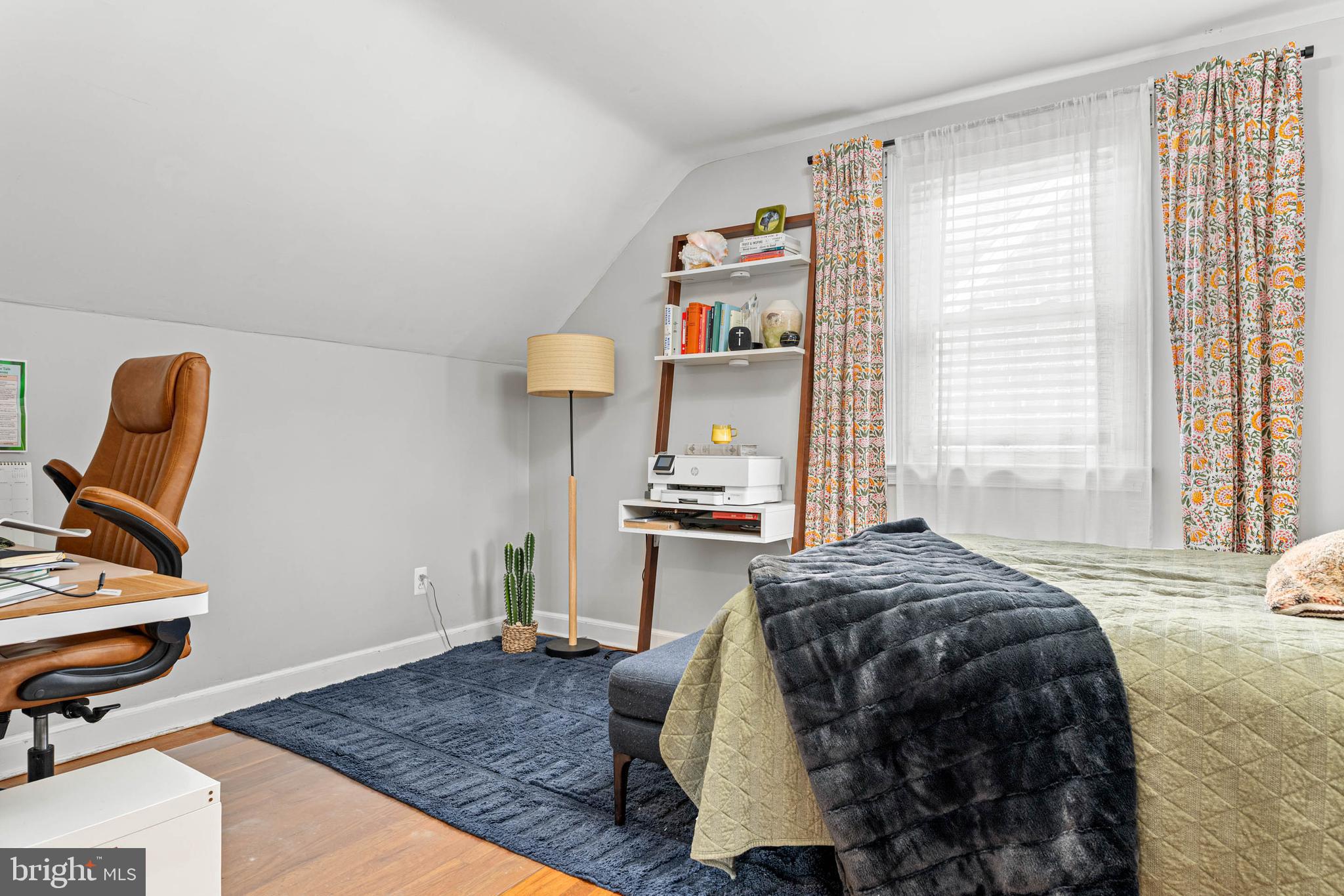 21 Moreland Road Paoli, PA 19301 - Photo 17 of 29 a bed sitting in a bedroom next to a window