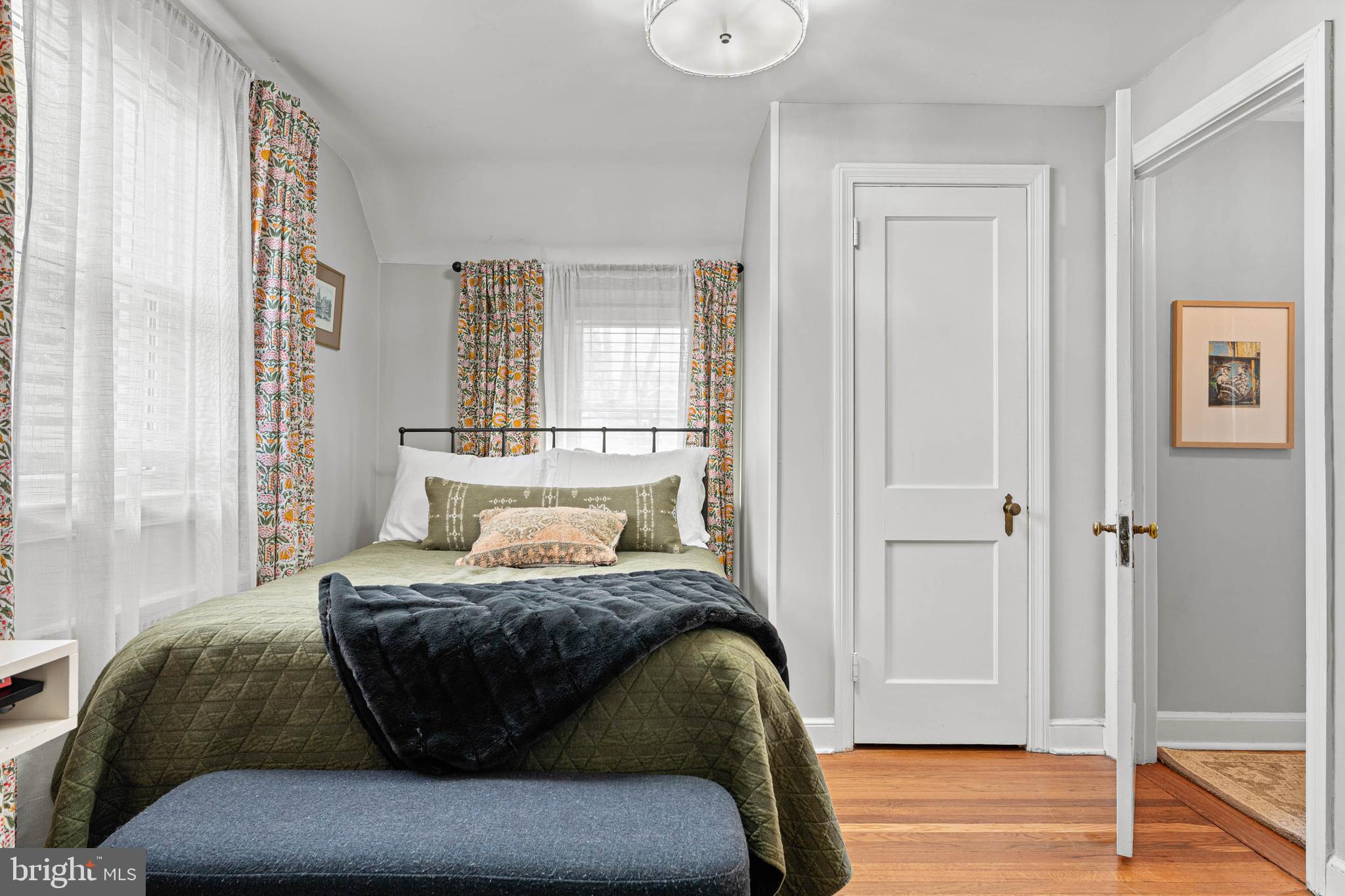 21 Moreland Road Paoli, PA 19301 - Photo 18 of 29 a bedroom with a bed couch and window