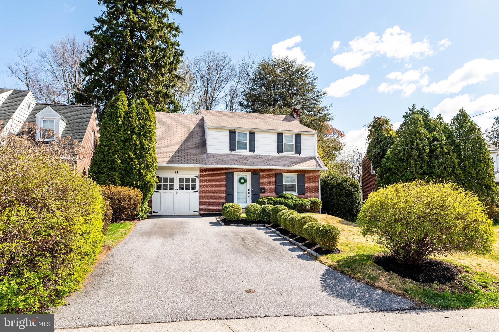 21 Moreland Road Paoli, PA 19301 - Photo 2 of 29 a front view of a house with garden