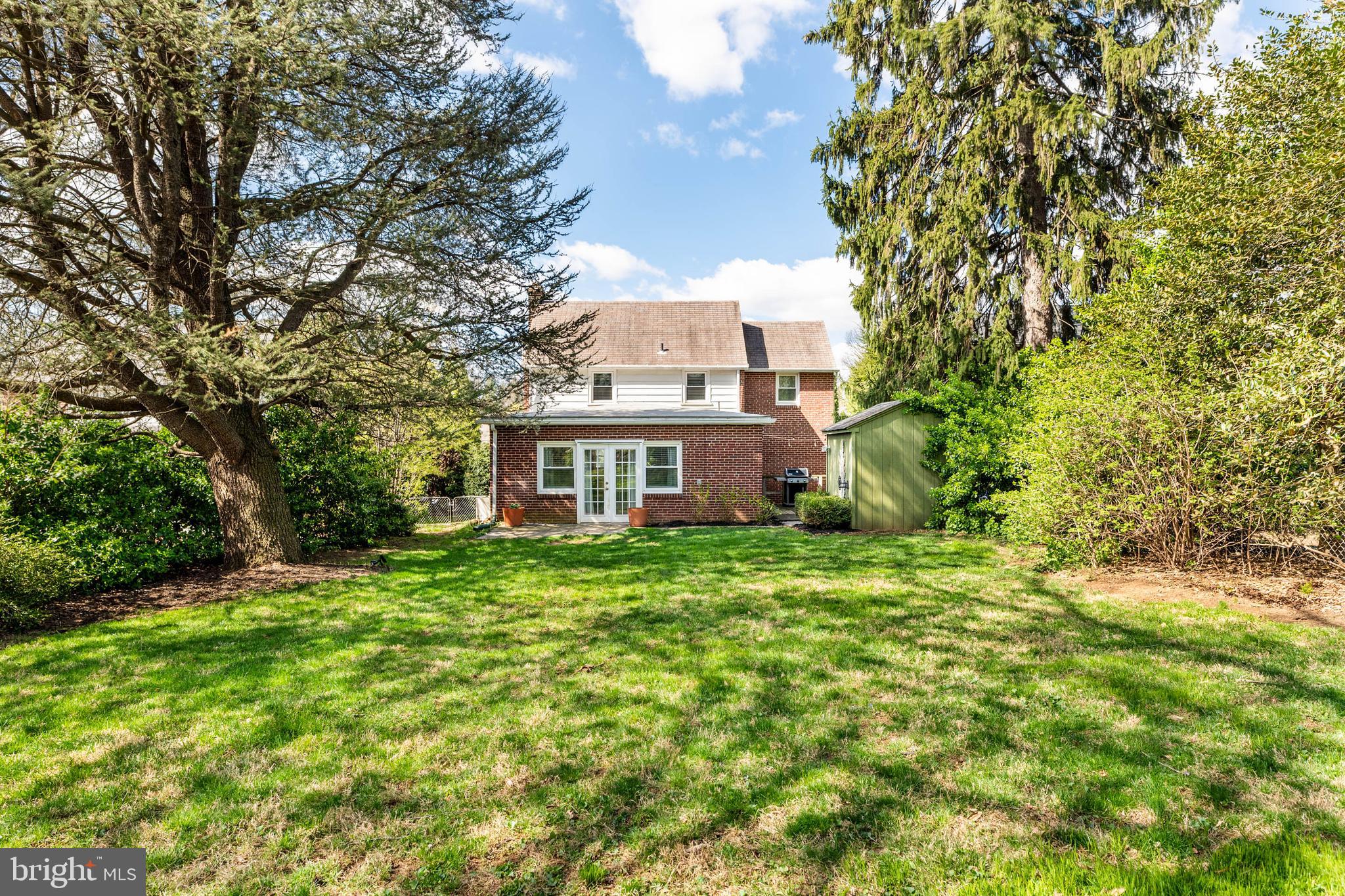 21 Moreland Road Paoli, PA 19301 - Photo 26 of 29 a view of a big yard with plants and large trees
