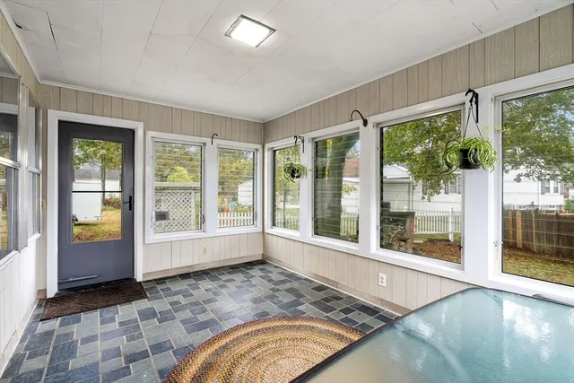 a view of front door with yard