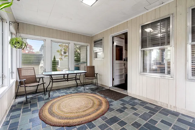 a room with furniture and window