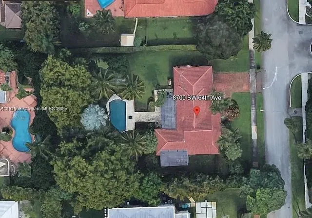 an aerial view of house with outdoor space
