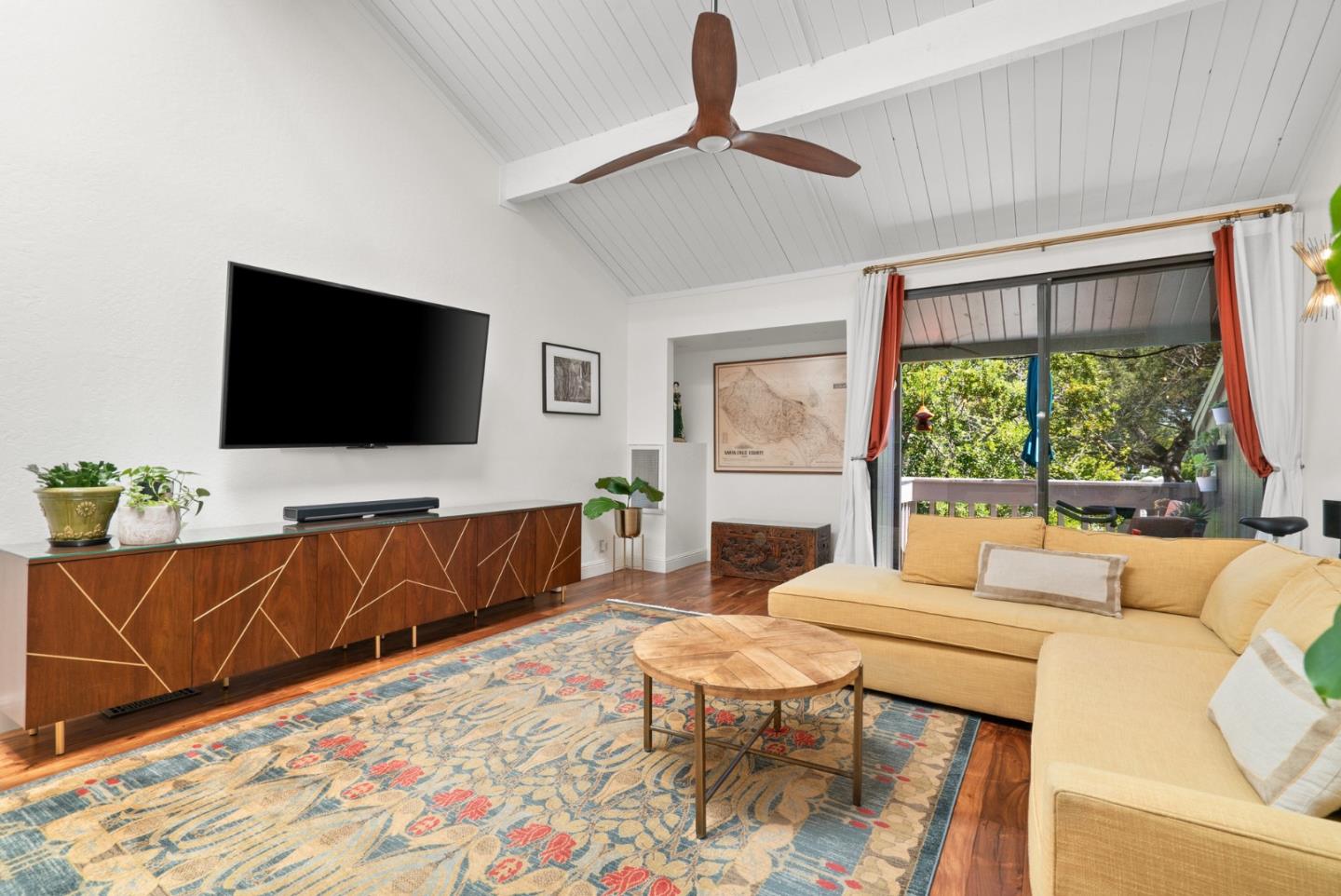 102 Tree Frog Lane Santa Cruz, CA 95060 - Photo 5 of 51 a living room with furniture and a flat screen tv