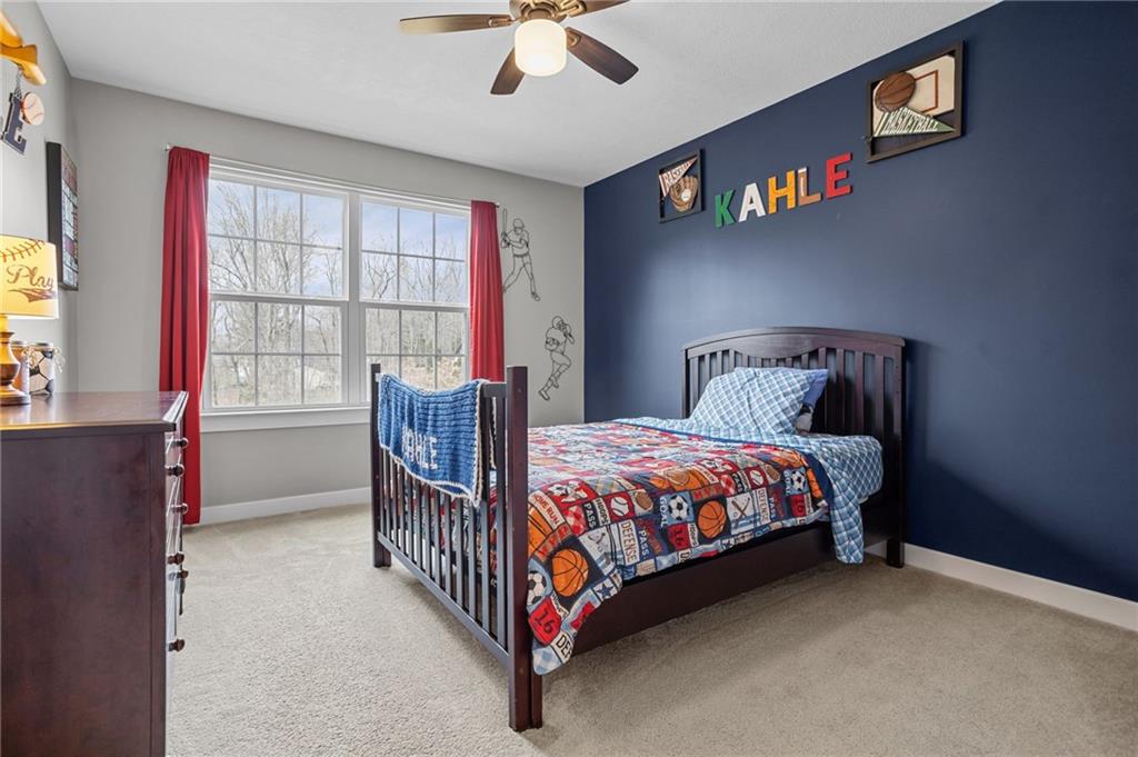 1075 Blackhawk Road Valencia, PA 16059 - Photo 16 of 25 a bedroom with a bed and a window