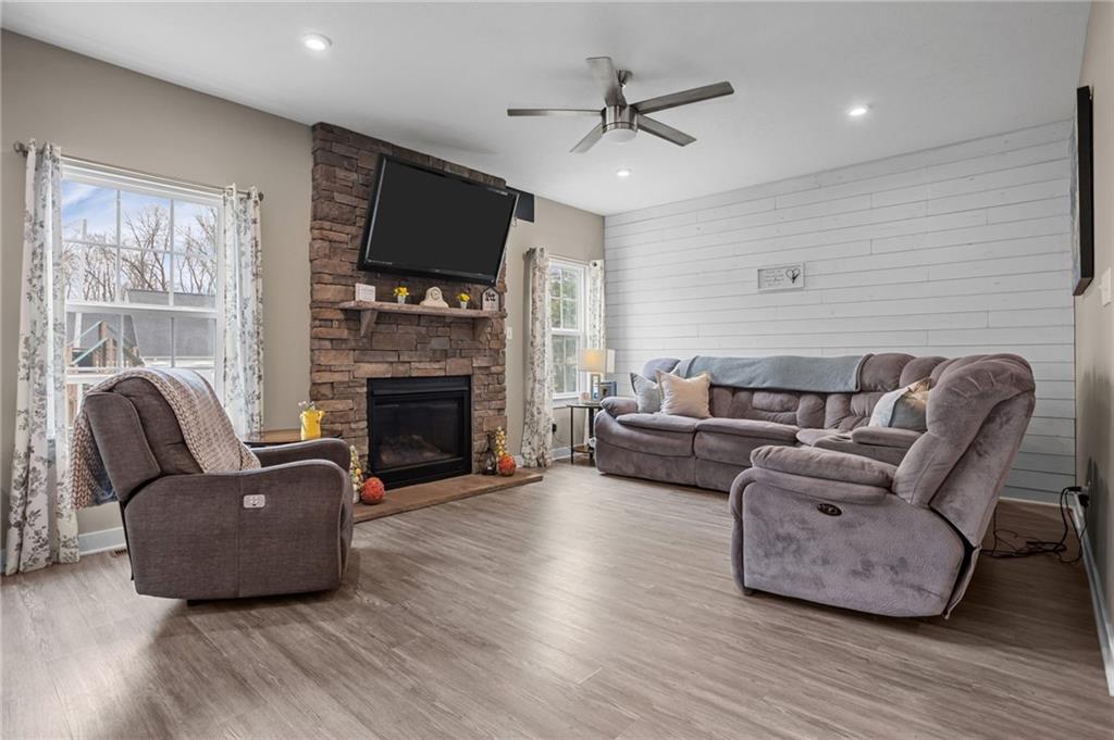 1075 Blackhawk Road Valencia, PA 16059 - Photo 4 of 25 a living room with furniture fireplace and flat screen tv