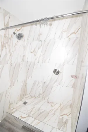 a bathroom with a shower curtain