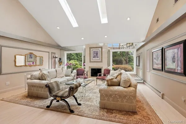 a living room with furniture or couch and a fireplace