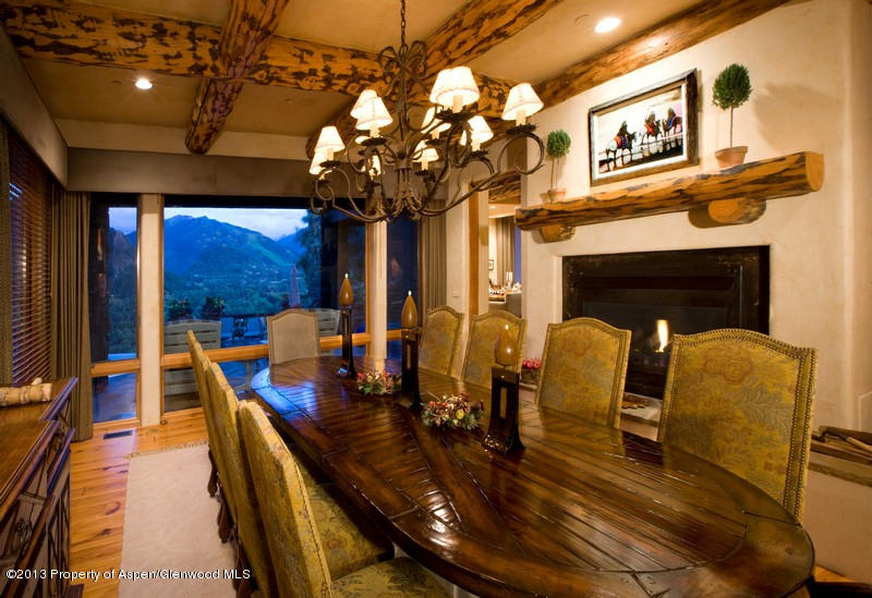 10 Ridge Place Aspen, CO 81612 - Photo 13 of 37 a view of a dining room with furniture a chandelier and wooden floor