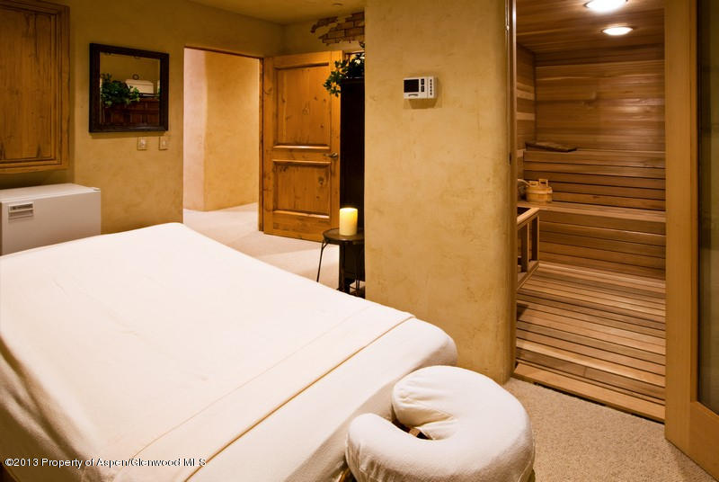 10 Ridge Place Aspen, CO 81612 - Photo 15 of 37 a bedroom with a bed and a cabinets