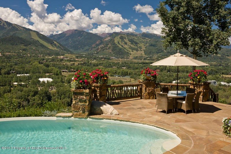 10 Ridge Place Aspen, CO 81612 - Photo 20 of 37 a front view of a house with yard and sitting area