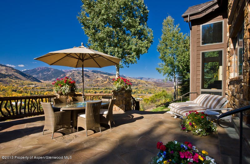10 Ridge Place Aspen, CO 81612 - Photo 23 of 37 a view of a chairs and table in backyard