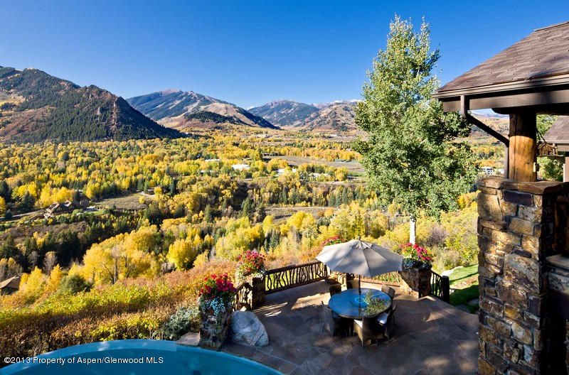 10 Ridge Place Aspen, CO 81612 - Photo 35 of 37 a view of a bench in a backyard