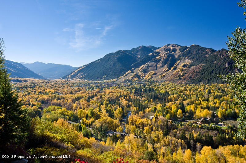 10 Ridge Place Aspen, CO 81612 - Photo 36 of 37 a view of a large building with mountains in the background