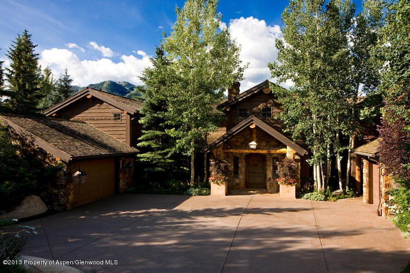 10 Ridge Place Aspen, CO 81612 - Photo 5 of 37 a front view of a house with a yard