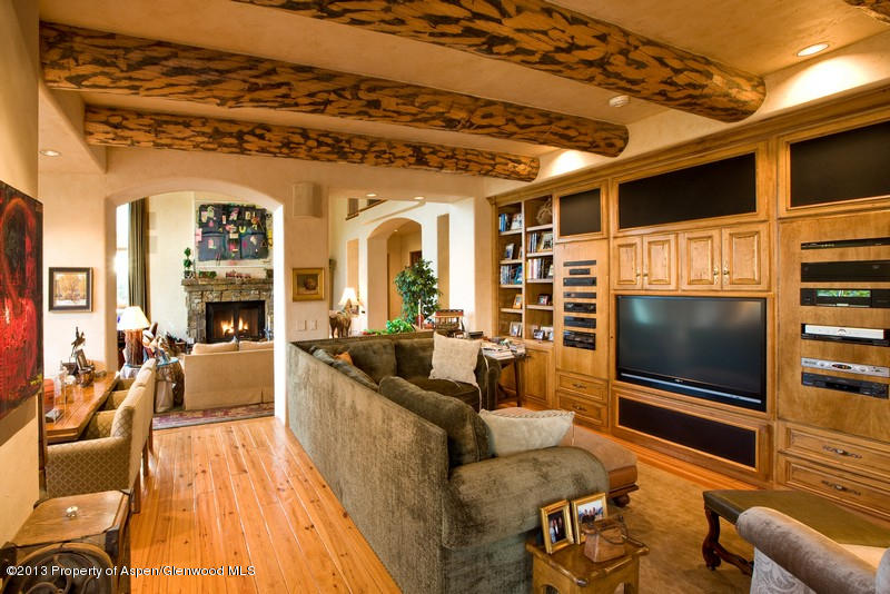 10 Ridge Place Aspen, CO 81612 - Photo 10 of 37 a living room with fireplace furniture and a flat screen tv