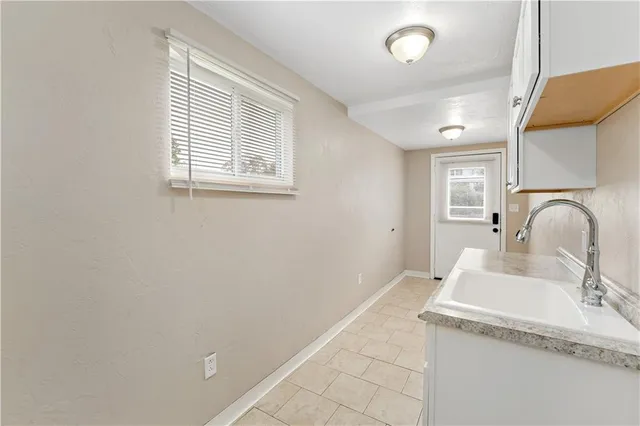 a bathroom with a sink and vanity