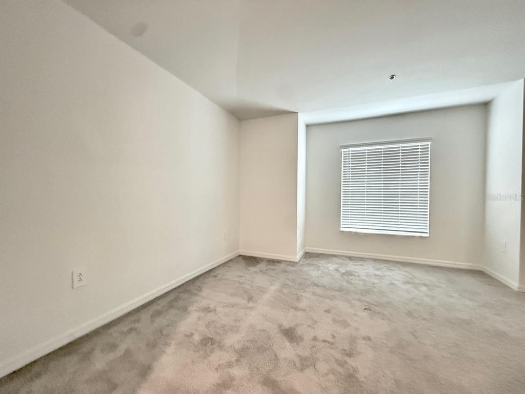 14261 Heritage Landing Boulevard, Unit 1621 Punta Gorda, FL 33955 - Photo 32 of 55 a view of an empty room with a window