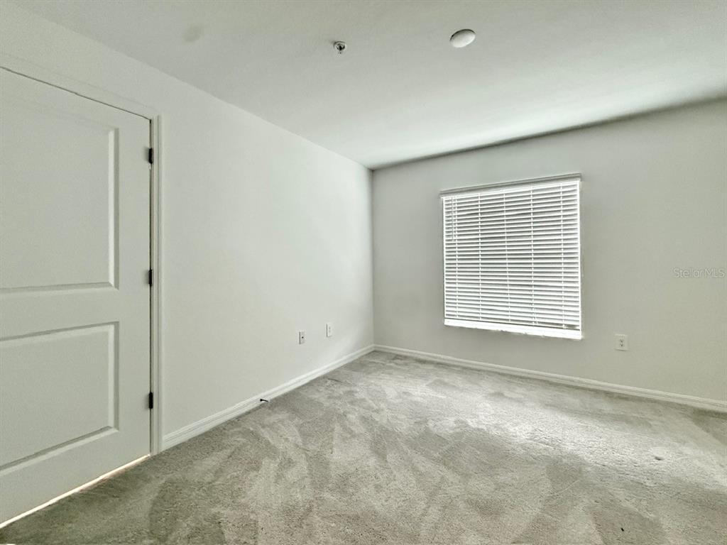 14261 Heritage Landing Boulevard, Unit 1621 Punta Gorda, FL 33955 - Photo 39 of 55 a view of an empty room with a window