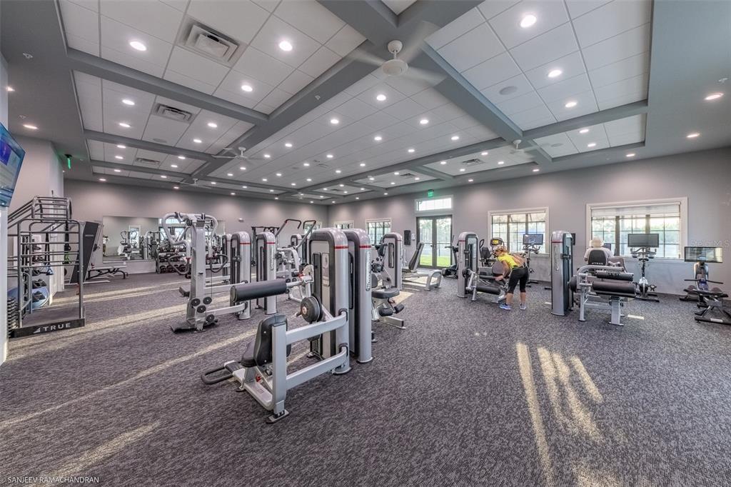 14261 Heritage Landing Boulevard, Unit 1621 Punta Gorda, FL 33955 - Photo 52 of 55 a view of a room with gym equipment